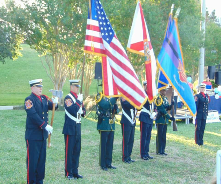 Honor Guard Outdoor Photo with six fightfighters holding flags.