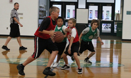 Youth playing basketball