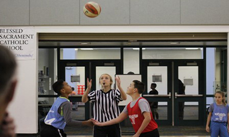 Youth playing basketball