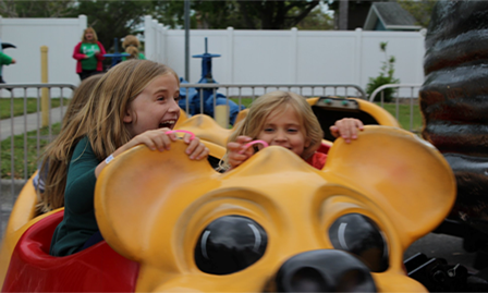 Kids on ride at Pow Wow Festival