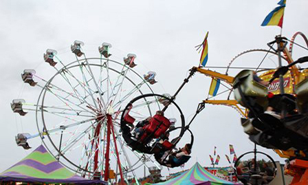 Kids on ride at Pow Wow Festival