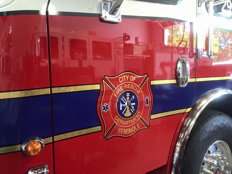 Fire Rescue logo on side of a fire truck